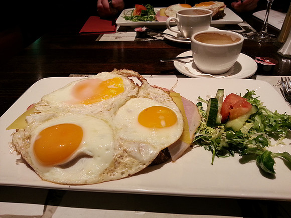 Famous egg, ham, cheese on dark bread