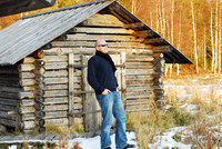 Taking a break near some cool cabin outfit